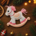 Load image into Gallery viewer, Decorative rocking horse ornament on a wooden surface with Christmas decorations.