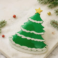 Load image into Gallery viewer, Green Christmas tree-shaped cookie with a gold star on a snowy background