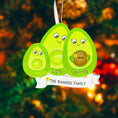 Load image into Gallery viewer, Avocado-themed pregnancy announcement decoration with 'We're Expecting' text on a blurred nature background.