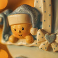 Load image into Gallery viewer, Personalized baby boy Christmas ornament featuring a light blue stroller with glitter details and a smiling baby wearing a blue nightcap. Custom name appears on the top and year on the bottom, making it a perfect Baby’s First Christmas keepsake. This blue resin holiday ornament is ideal for newborn boys, baby shower gifts, and celebrating a special first Christmas memory.