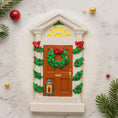 Load image into Gallery viewer, Decorative door with Christmas wreath and ornaments on a marble surface
