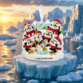 Load image into Gallery viewer, Decorative penguin family ornament on a ice floe with a sunset background