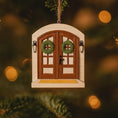 Load image into Gallery viewer, Decorative fairy door ornament with wreaths on a blurred Christmas tree background
