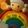 Load image into Gallery viewer, Toy figure with rainbow and 'Our Little Miracle' text, featuring a soft focus background.