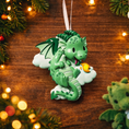 Load image into Gallery viewer, green dragon ornament designed with a fully sculpted 3D front that showcases raised details and expressive features, paired with a smooth 2D flat back for lightweight hanging. The glossy finish enhances the depth of the front design while keeping the back clean and minimal. Personalized name and year placement are clearly visible, making this dragon ornament a magical keepsake and a charming addition to holiday decor or fantasy themed collections.