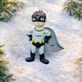 Load image into Gallery viewer, Personalized superhero boy Christmas ornament featuring a mask, cape and custom name. Cute holiday decor for boys, perfect for Christmas trees and gift-giving. Add name and year to create a unique keepsake. Display photos are AI-generated; please check the first image for the original product.
