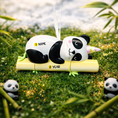 Load image into Gallery viewer, Fully 3D personalized unicorn panda Christmas ornament featuring a sleeping panda resting on a bamboo branch with a pastel unicorn horn. This ornament has a fully sculpted three dimensional front and back with no flat surfaces, creating a playful and premium look. Custom name and year are added by hand. Perfect for kids, panda lovers, unicorn fans, and whimsical holiday decor. A unique 3D keepsake for Christmas trees and seasonal displays.