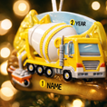 Load image into Gallery viewer, Personalized concrete mixer truck ornament for kids. Bright yellow cement truck Christmas decoration with custom name and year. Fun construction theme holiday decor for boys who love trucks, building toys, machinery and vehicles.