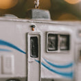 Load image into Gallery viewer, Decorative ornament resembling a vintage camera with a blurred bokeh background