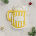 Load image into Gallery viewer, Yellow mug with white foam on a textured surface with Christmas decorations