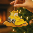 Load image into Gallery viewer, Yellow bulldozer ornament with a face on a Christmas tree