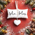 Load image into Gallery viewer, Personalized Mr and Mrs pillow ornament featuring a soft white cushion design with hanging heart detail. A romantic keepsake for newlyweds celebrating their first Christmas married or Valentine’s Day. Perfect wedding gift anniversary decor and couple ornament.