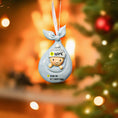 Load image into Gallery viewer, Personalized baby Christmas ornament with customizable text, hanging on a decorated tree.