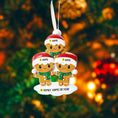Load image into Gallery viewer, Personalized gingerbread family Christmas ornament with customizable names against a festive background.