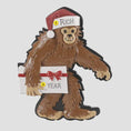 Load image into Gallery viewer, This playful Bigfoot Christmas ornament features a cheerful sasquatch character wearing a Santa hat and holding a gift, finished with a glossy surface that highlights the raised details and festive colors. The design brings a fun and whimsical holiday vibe, making it a standout decoration for Christmas trees, shelves, or seasonal displays, especially for Bigfoot lovers and collectors of unique holiday ornaments.