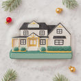 Load image into Gallery viewer, Decorative house ornament on a light gray background with Christmas decorations.