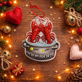 Load image into Gallery viewer, Decorative ornament with two lobsters in a pot on a wooden surface with Christmas decorations.