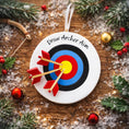 Load image into Gallery viewer, Personalized archery ornament featuring a colorful target and arrows design, customized with a name and year. Perfect for archery lovers, hunters, target shooting fans, and outdoor sports enthusiasts. This unique Christmas ornament celebrates precision, focus, and passion for archery, making it a meaningful holiday keepsake or gift for athletes, hobbyists, and competitive shooters.
