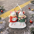 Load image into Gallery viewer, Decorative Christmas ornament with two mice in sweaters on a snowy ground.