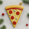 Load image into Gallery viewer, Decorative pizza slice cookie with Christmas decorations on a light background