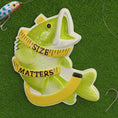 Load image into Gallery viewer, Fishing lure with a fish-shaped ruler displaying 'Size Matters' on a green background