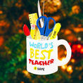 Load image into Gallery viewer, Personalized teacher ornament designed as a white mug filled with classroom tools including scissors ruler pencil and marker. The front reads Worlds Best Teacher with custom name personalization. Mostly 2D design with raised 3D tool details. A perfect Christmas ornament gift for teachers educators and school staff.