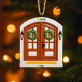 Load image into Gallery viewer, Decorative door ornament with wreaths on a blurred Christmas tree background
