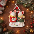 Load image into Gallery viewer, Decorative Christmas ornament of two mice in sweaters with a candy cane and music book, surrounded by festive decorations.