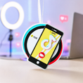 Load image into Gallery viewer, Smartphone ornament with TikTok app on a stand with blurred background