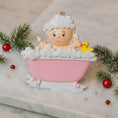 Load image into Gallery viewer, Decorative ornament of a baby in a bathtub with bubbles and a rubber duck, surrounded by Christmas decorations.