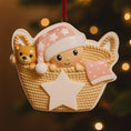 Load image into Gallery viewer, Personalized Baby Girl First Christmas Ornament featuring a detailed 3D front design with a sweet baby resting inside a woven basket, pink nightcap, teddy bear, and hanging star for the year. The babyâs name is added on the hat and the year on the star, creating a meaningful keepsake. Soft pink tones, cozy textures, and dimensional elements make it perfect for newborn girl gifts, baby shower presents, and treasured first Christmas tree memories.