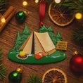 Load image into Gallery viewer, Decorative camping ornament with trees, tent, and sign on a wooden surface with Christmas decorations.