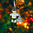 Load image into Gallery viewer, Personalized superhero boy Christmas ornament featuring a mask, cape and custom name. Cute holiday decor for boys, perfect for Christmas trees and gift-giving. Add name and year to create a unique keepsake. Display photos are AI-generated; please check the first image for the original product.