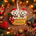 Load image into Gallery viewer, Personalized Christmas dog ornament featuring two adorable dalmatian puppies sitting together on a cozy basket, each wearing a Santa hat and holding a bone. Both puppies can be customized with names, while the front of the basket is personalized with a year or family name. Decorated with festive details like a stocking, gift box, and holiday accents, this ornament has a raised 3D front and smooth finish, making it perfect for dog lovers, couples, families, and Christmas tree decor.