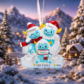 Load image into Gallery viewer, personalized Christmas ornament with yeti family of three in winter clothing