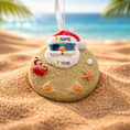 Load image into Gallery viewer, Decorative ornament shaped like a beach ball with a Santa Claus face, sunglasses, and beach elements on sand with ocean background.