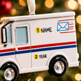 Load image into Gallery viewer, Decorative mail truck ornament with customizable text on a blurred Christmas tree background