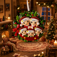 Load image into Gallery viewer, Decorative family ornament with cartoon characters in a festive living room setting.