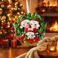 Load image into Gallery viewer, Christmas ornament with family of 3 design on a blurred Christmas tree background