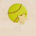 Load image into Gallery viewer, Decorative keychain shaped like a softball with a star charm on a beige background
