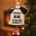 Load image into Gallery viewer, Decorative ornament shaped like a t-shirt with text and gaming controller design, held against a blurred festive background.