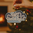 Load image into Gallery viewer, Personalized Big Brother Christmas ornament with custom name and year detail in layered blue and white design. This sibling holiday ornament features raised 3D front lettering and a lightweight flat back, perfect for Christmas tree decor.