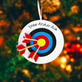 Load image into Gallery viewer, Personalized archery ornament featuring a colorful target and arrows design, customized with a name and year. Perfect for archery lovers, hunters, target shooting fans, and outdoor sports enthusiasts. This unique Christmas ornament celebrates precision, focus, and passion for archery, making it a meaningful holiday keepsake or gift for athletes, hobbyists, and competitive shooters.