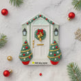 Load image into Gallery viewer, Decorative Christmas door with wreath and ornaments on a marble surface.
