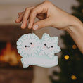 Load image into Gallery viewer, Personalized snowflake couple ornament featuring two smiling snowflakes, customized with two names and a year or family name. A perfect Christmas keepsake for couples, partners, siblings, or loved ones celebrating winter memories together. This festive ornament adds a playful and heartfelt touch to holiday decor, making it a meaningful gift for Christmas, anniversaries, or winter celebrations.