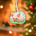 Load image into Gallery viewer, Decorative pig ornament with customizable text on a blurred Christmas tree background