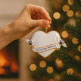 Load image into Gallery viewer, Heart shaped pet memorial Christmas ornament designed to honor the loving memory of a beloved pet. Features angel wing paw details and a soft elegant design that brings comfort and warmth during the holiday season. Includes a customizable name and year area, allowing you to create a meaningful keepsake in remembrance of a cherished companion. Perfect for memorial Christmas trees sympathy gifts pet loss remembrance and heartfelt holiday decor.