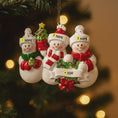 Load image into Gallery viewer, Three snowman ornaments with personalized name tags on a Christmas tree.