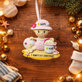 Load image into Gallery viewer, Personalized baby first Christmas ornament for baby girl featuring a beach and summer inspired design. This adorable keepsake includes handwritten name and year personalization, a soft pink baby figure, sand details and playful seaside elements. The ornament has a lightweight 2D base with raised 3D detailing on the front only. Perfect for babyâs first Christmas, nursery decor, coastal holiday themes and meaningful family gifts.