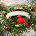 Load image into Gallery viewer, Personalized cardinal wreath ornament featuring a vibrant red cardinal bird surrounded by green holly leaves and red berries. Designed with a smooth glossy finish and a raised 3D front with a flat back for easy hanging. Includes free handwritten personalization with one name and year displayed on the banner at the top. Styled in a warm festive holiday setting with soft Christmas lights candy details and seasonal decor. A meaningful Christmas tree ornament symbolizing remembrance love and connection perfect